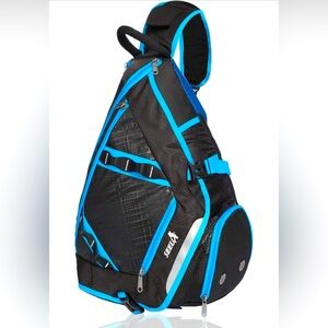 SeeU brand backpack. Black with blue outlining. Has several zipped compartments.